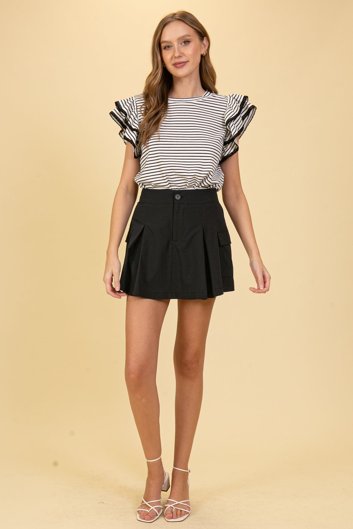 The PS Collective striped ruffle top — relaxed feminine silhouette with cap sleeve ruffle detail