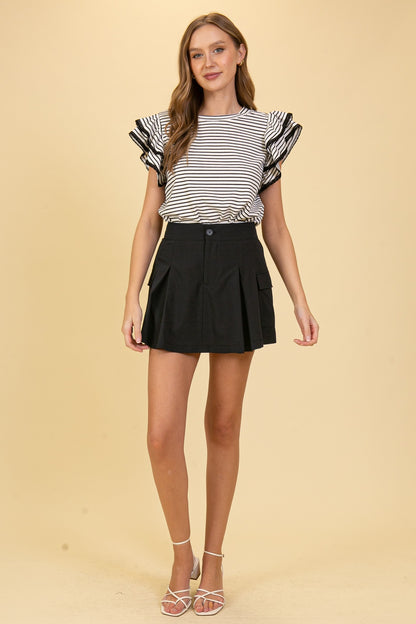 The PS Collective striped ruffle top — relaxed feminine silhouette with cap sleeve ruffle detail