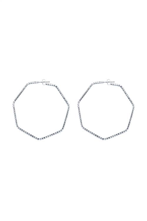 Two hexagonal silver hoop earrings on a white background