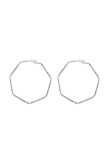 Two hexagonal silver hoop earrings on a white background