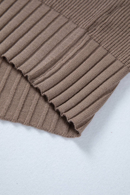 Close-up of a brown ribbed fabric on a light gray background