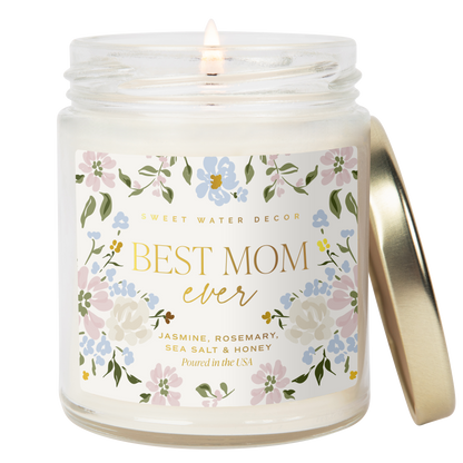 Candle in a jar with a decorative label reading 'Best Mom Ever' on a white background.