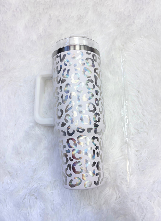 Tumbler with leopard print pattern on a white background