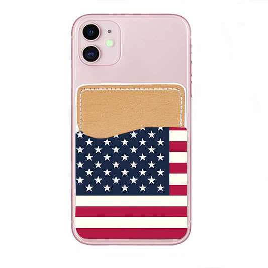 A light pink phone case featuring a tan faux-leather card slot on the back, positioned above an American flag graphic with white stars and red and white stripes.