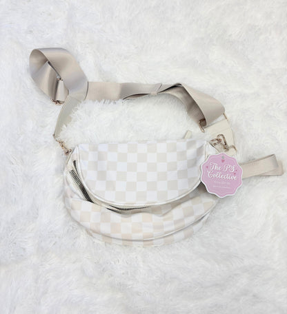 Beige checkered crossbody belt bag on a soft white background with adjustable strap, trendy neutral handbag for everyday outfits and hands-free style

