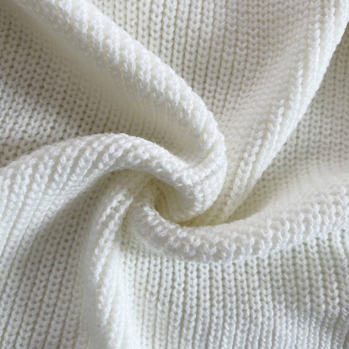Close-up of textured white fabric