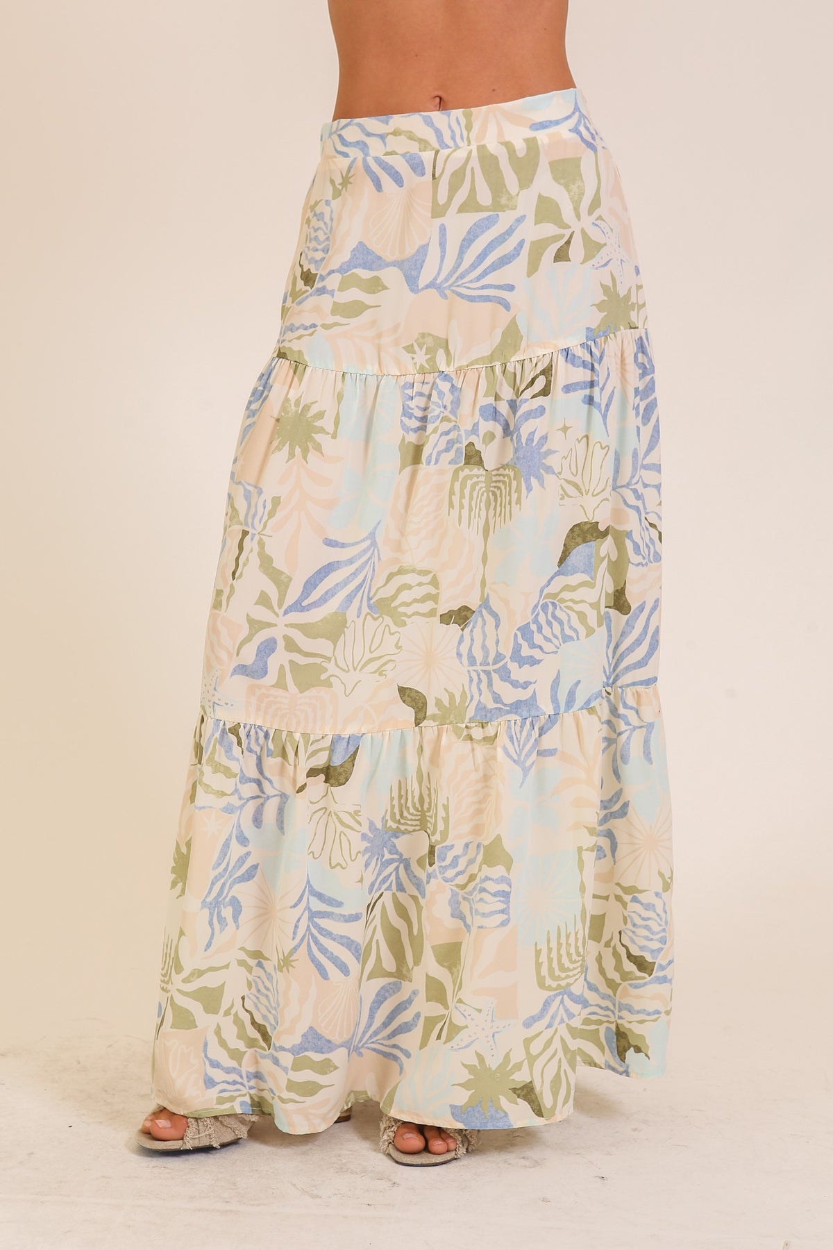 Island Escape Tiered Maxi Skirt from The PS Collective — breezy woven fabric with tropical print and relaxed fit