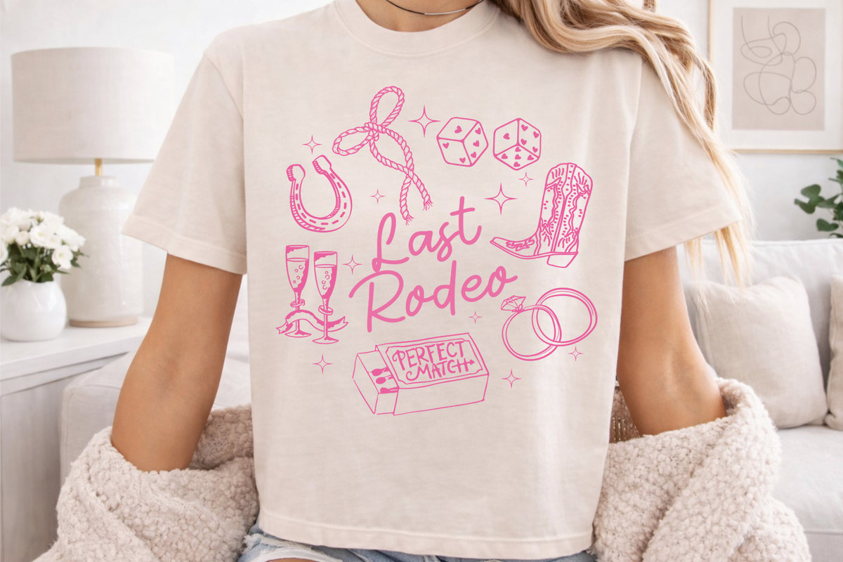 The PS Collective Last Rodeo Tee — original pink western graphic bachelorette tee in ivory, styled with denim